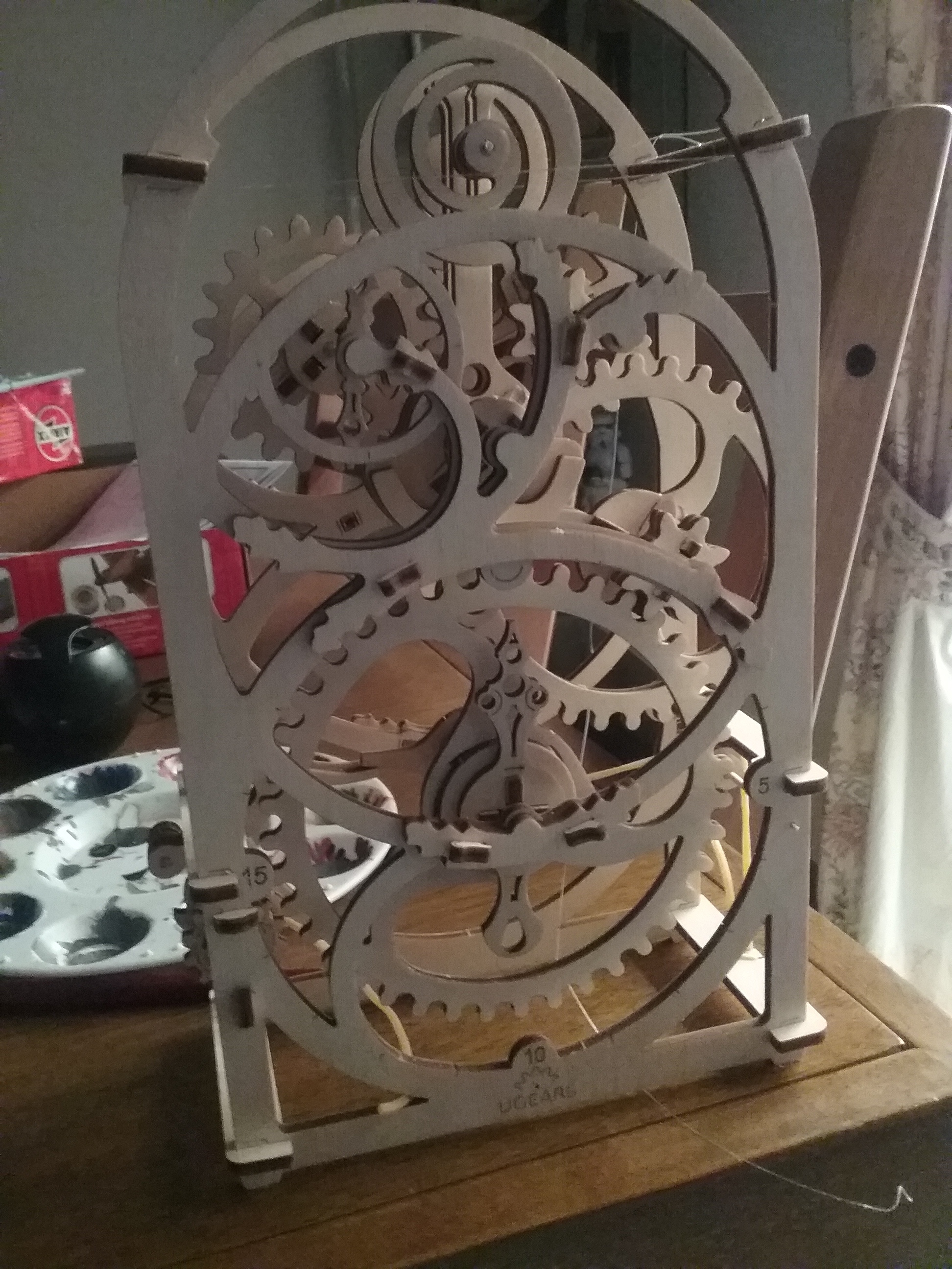 A wooden clockwork device